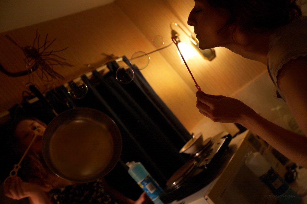 emma and molly blowing&nbsp;bubbles
